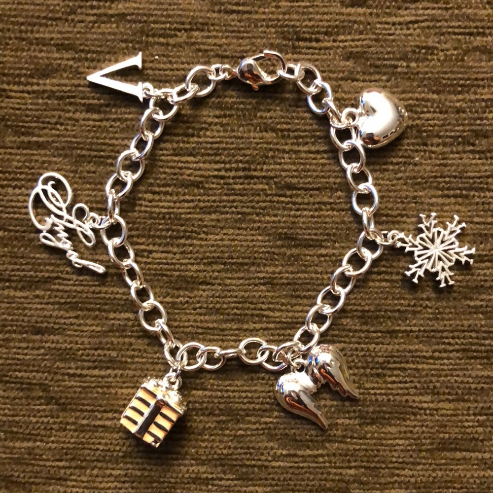 Victoria’s Secret NWOT Silver tone  6 Charm Bracetel